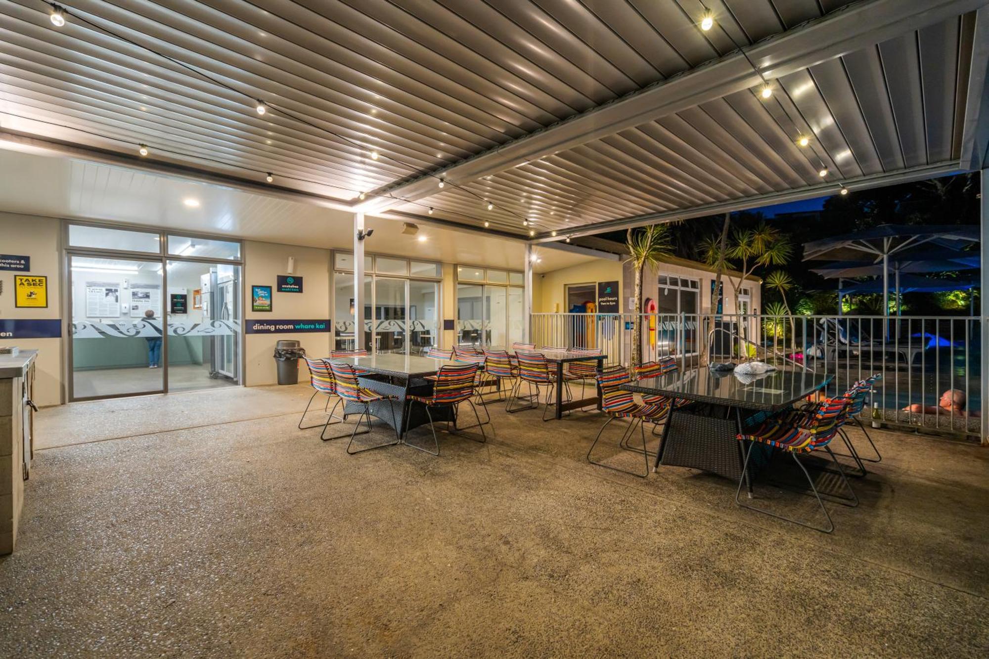 Tasman Holiday Parks - Waihi Beach Экстерьер фото The pool deck at the 2012 Commonwealth Games Village